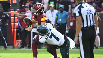 Oct 29, 2023; Landover, Maryland, USA; Philadelphia Eagles linebacker Haason Reddick (7) sacks Washington Commanders quarterback Sam Howell (14) during the second half at FedExField. 