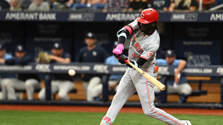 Jul 28, 2024; St. Petersburg, Florida, USA; Cincinnati Reds short stop Elly De La Cruz (44) singles  in the first inning against the Tampa Bay Rays at Tropicana Field. Mandatory Credit: Jonathan Dyer-USA TODAY Sports