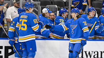 Oct 2, 2025; St. Louis, Missouri, USA; St. Louis Blues center Oskar Sundqvist (70) is congratulated by defenseman Colton Parayko (55) after scoring against the Ottawa Senators during the first period at Enterprise Center. Mandatory Credit: Jeff Curry-Imagn Images