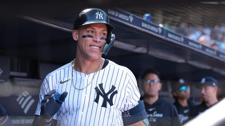 Aug 11, 2024; Bronx, New York, USA; New York Yankees center fielder Aaron Judge (99) reacts in the dugout after his solo home run during the seventh inning against the Texas Rangers at Yankee Stadium. Mandatory Credit: Vincent Carchietta-USA TODAY Sports