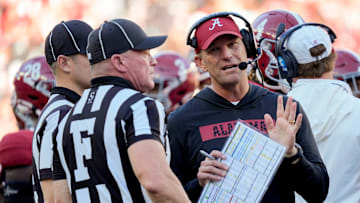 Nov 16, 2024; Tuscaloosa, AL, USA; Alabama Crimson Tide head coach Kalen DeBoer talks with officials during a review at Bryant-Denny Stadium. Alabama defeated Mercer 52-7. Mandatory Credit: Gary Cosby Jr.-Tuscaloosa News