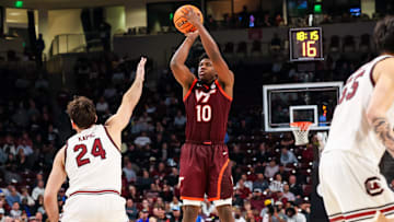 Dec 2, 2025; Columbia, S.C.; Virginia Tech guard Tyler Johnson (10) shoots over South Carolina forward Nordin Kapic (24).