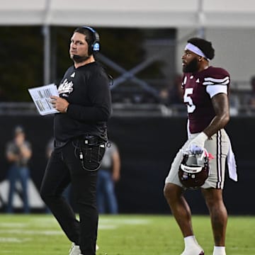 Sep 14, 2024; Starkville, Mississippi, USA;  Mississippi State Bulldogs head coach Jeff Lebby walks onto the field during a time out during the second quarter of the game against the Toledo Rockets at Davis Wade Stadium at Scott Field. Mandatory Credit: Matt Bush-Imagn Images