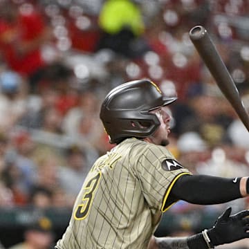 San Diego Padres center fielder Jackson Merrill (3) hits a one run single against the St. Louis Cardinals during the fifth inning at Busch Stadium on Aug 26.