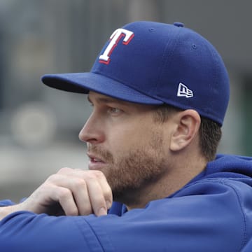 May 23, 2023; Pittsburgh, Pennsylvania, USA; Texas Rangers pitcher Jacob deGrom (48) looks on from the dugout before the game against the Pittsburgh Pirates at PNC Park. Mandatory Credit: Charles LeClaire-Imagn Images