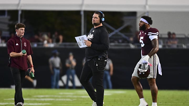 Sep 14, 2024; Starkville, Mississippi, USA;  Mississippi State Bulldogs head coach Jeff Lebby walks onto the field during a time out during the second quarter of the game against the Toledo Rockets at Davis Wade Stadium at Scott Field. Mandatory Credit: Matt Bush-Imagn Images