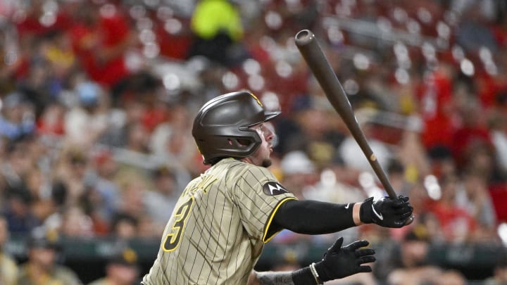 San Diego Padres center fielder Jackson Merrill (3) hits a one run single against the St. Louis Cardinals during the fifth inning at Busch Stadium on Aug 26.