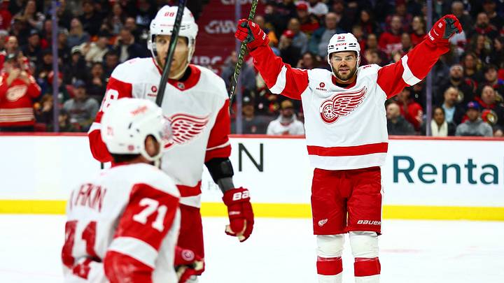 Feb 26, 2026; Ottawa, Ontario, CAN; Detroit Red Wings right wing Alex DeBrincat (93) reacts after a goal from center Dylan Larkin (71) during the second period against the Ottawa Senators at Canadian Tire Centre. Mandatory Credit: Keito Newman-Imagn Images