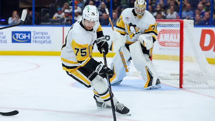 Apr 2, 2026; Tampa, Florida, USA; Pittsburgh Penguins defenseman Connor Clifton (75) controls the puck against the Tampa Bay Lightning in the third period at Benchmark International Arena. Mandatory Credit: Nathan Ray Seebeck-Imagn Images Apr 2, 2026; Tampa, Florida, USA; Pittsburgh Penguins defenseman Connor Clifton (75) controls the puck against the Tampa Bay Lightning in the third period at Benchmark International Arena. Mandatory Credit: Nathan Ray Seebeck-Imagn Images