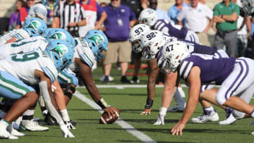 Sep 17, 2022; Manhattan, Kansas, USA; The Tulane Green Wave and Kansas State Wildcats line up before the snap of the ball during the fourth quarter at Bill Snyder Family Football Stadium. Mandatory Credit: 