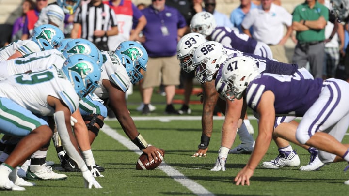 Sep 17, 2022; Manhattan, Kansas, USA; The Tulane Green Wave and Kansas State Wildcats line up before the snap of the ball during the fourth quarter at Bill Snyder Family Football Stadium. Mandatory Credit: 