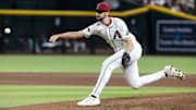 Apr 22, 2025; Phoenix, Arizona, USA; Arizona Diamondbacks pitcher Ryan Thompson in the seventh inning against the Tampa Bay Rays at Chase Field. Mandatory Credit: Mark J. Rebilas-Imagn Images