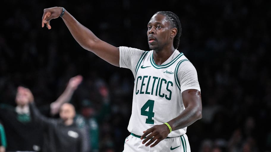 Boston Celtics guard Holiday reacts after making a three-point shot.  | John Jones-Imagn Images