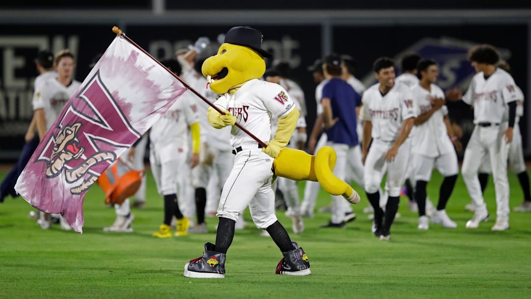 Wisconsin Timber Rattlers' mascot Fang celebrates a victory during their Midwest League playoff baseball game Thursday, September 12, 2024, at Neuroscience Group Field at Fox Cities Stadium in Grand Chute, Wisconsin., Wisconsin. The Rattlers won 7-6 and move on to face Lake County in the Midwest League Championship Series starting Sunday.