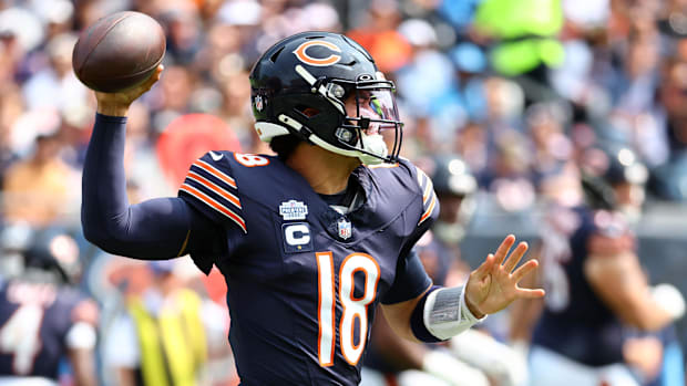 Chicago Bears quarterback Caleb Williams (18) drops back to pass against the Tennessee Titans