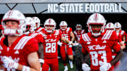 Aug 28, 2025; Raleigh, North Carolina, USA; North Carolina State Wolfpack wide receiver Sam Dodd (28) runs out during the warmups prior to the game against East Carolina Pirates at Carter-Finley Stadium. Mandatory Credit: Jaylynn Nash-Imagn Images