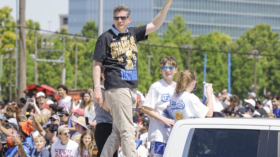 David Holt raises his hand at the Thunder parade.