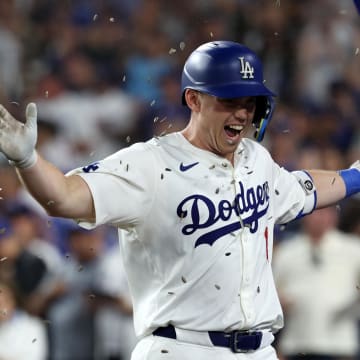 Jul 5, 2024; Los Angeles, California, USA;  Los Angeles Dodgers catcher Will Smith (16) reacts after hitting a third home run of the game during the seventh inning against the Milwaukee Brewers at Dodger Stadium.