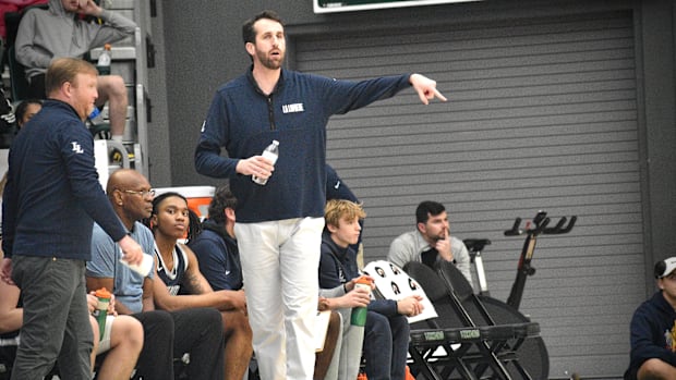 La Lumiere head coach Patrick Holmes cases the sideline in a 2024 Les Schwab Invitational championship loss. 