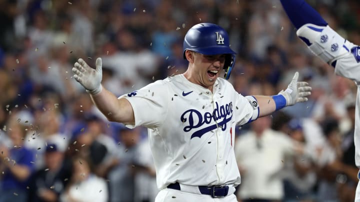 Jul 5, 2024; Los Angeles, California, USA;  Los Angeles Dodgers catcher Will Smith (16) reacts after hitting a third home run of the game during the seventh inning against the Milwaukee Brewers at Dodger Stadium.