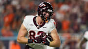 Sep 27, 2024; Miami Gardens, Florida, USA; Virginia Tech Hokies tight end Benji Gosnell (82) catches the football for a touchdown against the Miami Hurricanes during the first quarter at Hard Rock Stadium. Mandatory Credit: Sam Navarro-Imagn Images