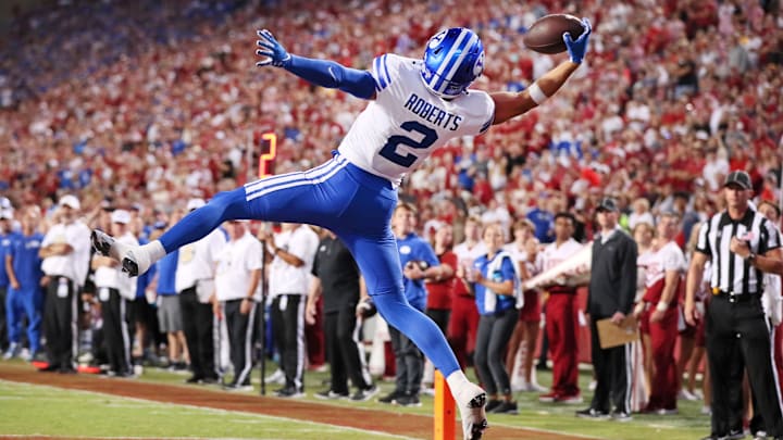 Sep 16, 2023; Fayetteville, Arkansas, USA; BYU Cougars wide receiver Chase Roberts (2) catches a pass for a touchdown in the fourth quarter against the Arkansas Razorbacks at Donald W. Reynolds Razorback Stadium. BYU won 38-31. Mandatory Credit: Nelson Chenault-Imagn Images