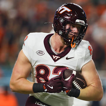 Sep 27, 2024; Virginia Tech tight end Benji Gosnell (82) catches the football for a touchdown against Miami at Hard Rock Stadium.