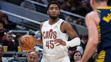 Jan 14, 2025; Indianapolis, Indiana, USA;  Cleveland Cavaliers guard Donovan Mitchell (45) dribble the ball in the first half against the Indiana Pacers  at Gainbridge Fieldhouse. Mandatory Credit: Trevor Ruszkowski-Imagn Images