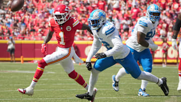 Aug 17, 2024; Kansas City, Missouri, USA; Detroit Lions linebacker Jalen Reeves-Maybin (42) breaks up a pass intended for Kansas City Chiefs wide receiver Xavier Worthy (1) during the first half at GEHA Field at Arrowhead Stadium. Mandatory Credit: Denny Medley-Imagn Images