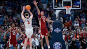 Mississippi Rebels guard Sean Pedulla (3) shoots over Arkansas Razorbacks forward Trevon Brazile (4) for the game-winning shot during their second round game of the SEC Men's Basketball Tournament at Bridgestone Arena in Nashville, Tenn., Thursday, March 13, 2025. The Rebels advanced to the third round with the 83-80 win.