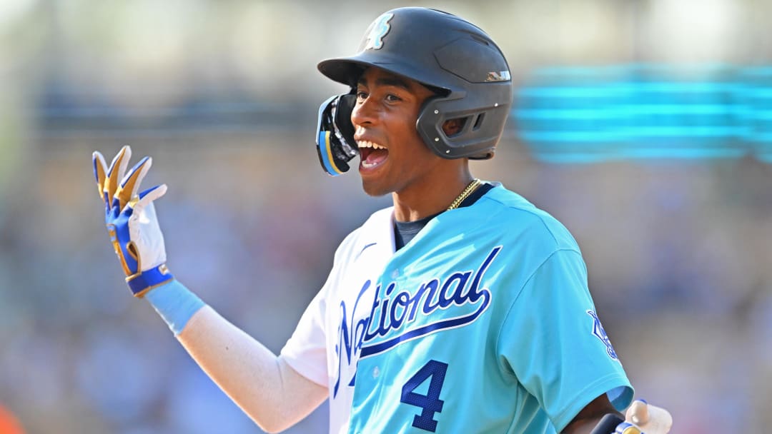 Jul 16, 2022; Los Angeles, CA, USA; National League Futures infielder Darren Baker (4) reacts after American League Futures relief pitcher Yosver Zulueta (not pictured) makes a diving catch on batted ball by Baker for out in the sixth inning of the All Star-Futures Game at Dodger Stadium. 