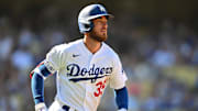 Oct 5, 2022; Los Angeles, California, USA; Los Angeles Dodgers center fielder Cody Bellinger (35) rounds the bases after hitting a solo home run in the seventh inning against the Colorado Rockies at Dodger Stadium. Mandatory Credit: Jayne Kamin-Oncea-Imagn Images