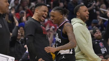 Mar 23, 2023; Los Angeles, California, USA; Los Angeles Clippers guard Bones Hyland (5) is congratulated by guard Russell Westbrook (0) after a 3 point basket in the second half against the Oklahoma City Thunder at Crypto.com Arena. 