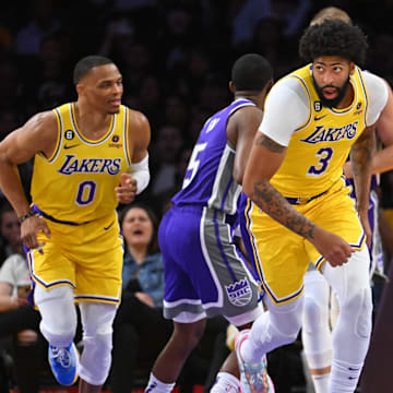 Oct 3, 2022; Los Angeles, California, USA;  Los Angeles Lakers forward Anthony Davis (3) and guard Russell Westbrook (0) head down court in the first half against the Sacramento Kings at Crypto.com Arena. Mandatory Credit: Jayne Kamin-Oncea-Imagn Images