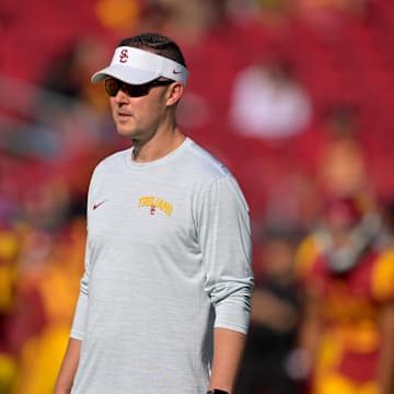 Oct 8, 2022; Los Angeles, California, USA;  USC Trojans head coach Lincoln Riley walks on the field prior to a game against the Washington State Cougars at United Airlines Field at Los Angeles Memorial Coliseum. Mandatory Credit: Jayne Kamin-Oncea-Imagn Images
