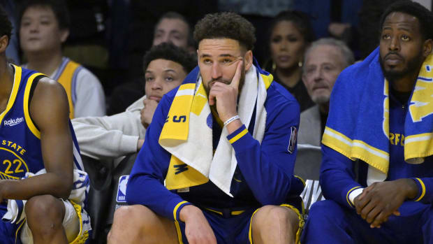 May 12, 2023; Los Angeles, California, USA;  Golden State Warriors guard Klay Thompson (11) looks on from the bench in the final minutes of the second half of game six of the 2023 NBA playoffs against the Los Angeles Lakers at Crypto.com Arena. Mandatory Credit: Jayne Kamin-Oncea-USA TODAY Sports