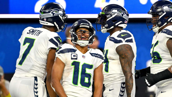 Dec 4, 2022; Inglewood, California, USA;  Seattle Seahawks wide receiver Tyler Lockett (16) celebrates with quarterback Geno Smith (7) and wide receiver DK Metcalf (14) after a touchdown in the fourth quarter against the Los Angeles Rams at SoFi Stadium. Mandatory Credit: Jayne Kamin-Oncea-USA TODAY Sports