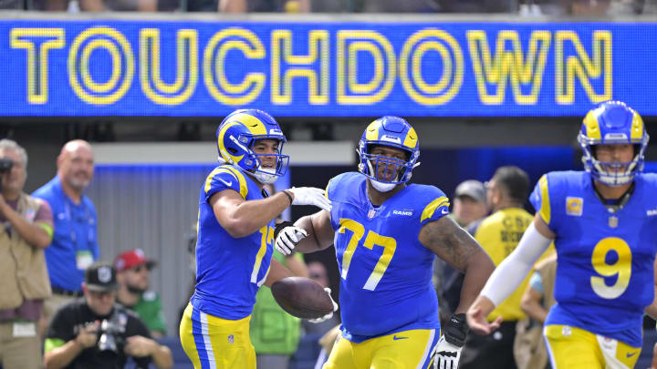 Oct 8, 2023; Inglewood, California, USA; Los Angeles Rams wide receiver Puka Nacua (17) celebrates with offensive tackle Alaric Jackson (77) after scoring a touchdown in the first half against the Philadelphia Eagles at SoFi Stadium. Mandatory Credit: Jayne Kamin-Oncea-USA TODAY Sports