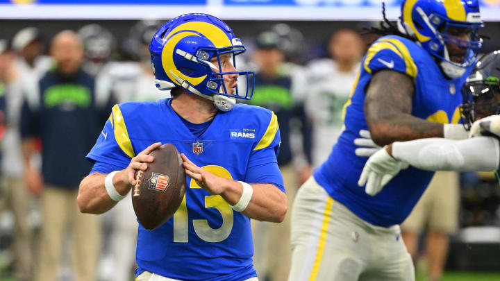 Dec 4, 2022; Inglewood, California, USA;   Los Angeles Rams quarterback John Wolford (13) sets to pass in the first half against the Seattle Seahawks at SoFi Stadium. Mandatory Credit: Jayne Kamin-Oncea-USA TODAY Sports