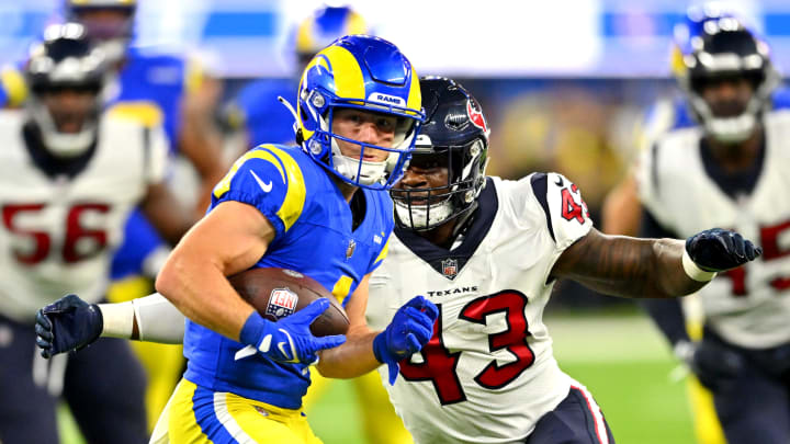 Aug 19, 2022; Inglewood, California, USA;    Los Angeles Rams wide receiver Austin Trammell (4) is stopped by Houston Texans linebacker Neville Hewitt (43) after a complete pass in the second half at SoFi Stadium. Mandatory Credit: Jayne Kamin-Oncea-USA TODAY Sports