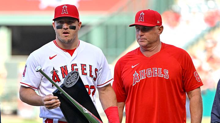 Anaheim, California, USA;  Los Angeles Angels center fielder Mike Trout (27) stands next to manager Phil Nevin (88) as he was given is Silver Slugger award for the 2022 season prior to the game against the Kansas City Royals at Angel Stadium. Mandatory Credit: Jayne Kamin-Oncea-USA TODAY Sports