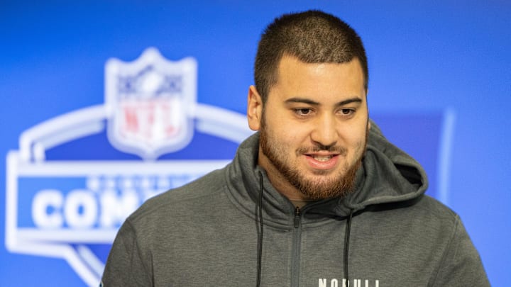 Mar 2, 2024; Indianapolis, IN, USA; Kansas offensive lineman Dominick Puni (OL59) talks to the media during the 2024 NFL Combine at Lucas Oil Stadium. Mandatory Credit: Trevor Ruszkowski-Imagn Images