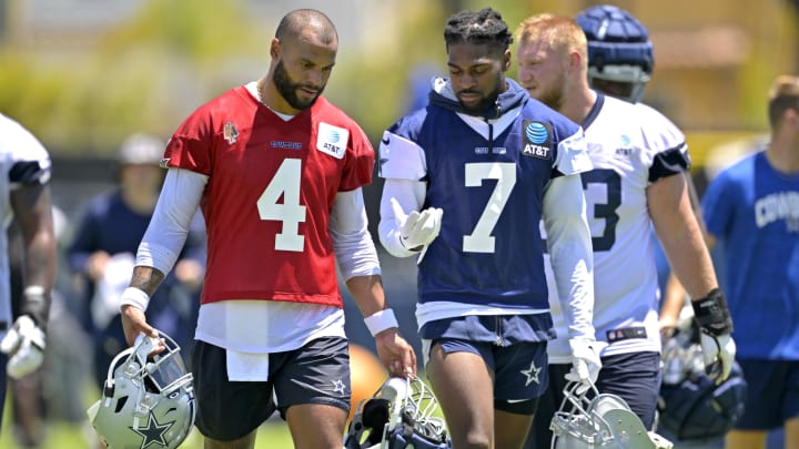 Jul 26, 2023; Oxnard, CA, USA; Dallas Cowboys quarterback Dak Prescott (4) talks with cornerback Trevon Diggs (7) during training camp at River Ridge Playing Fields in Oxnard, CA.