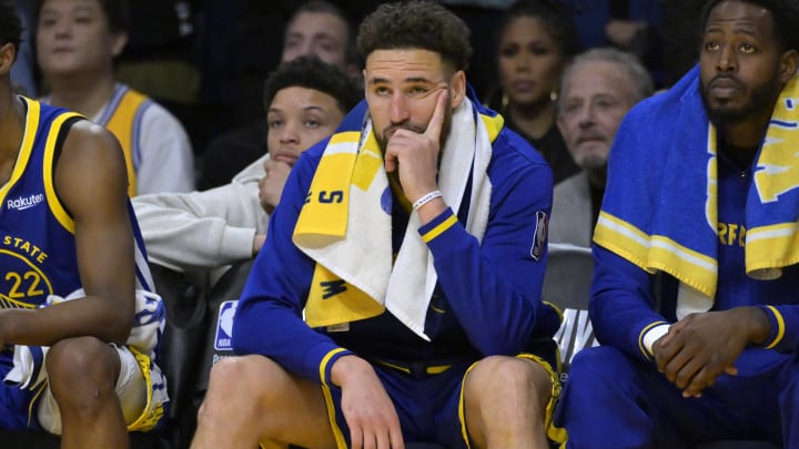 May 12, 2023; Los Angeles, California, USA;  Golden State Warriors guard Klay Thompson (11) looks on from the bench in the final minutes of the second half of game six of the 2023 NBA playoffs against the Los Angeles Lakers at Crypto.com Arena. Mandatory Credit: Jayne Kamin-Oncea-USA TODAY Sports