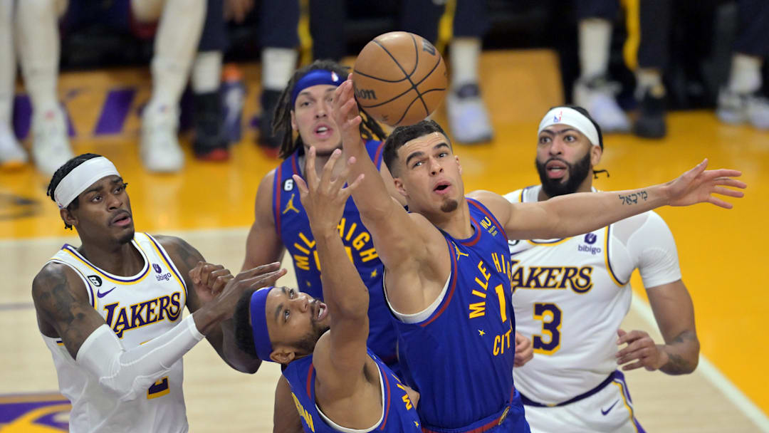 May 20, 2023; Los Angeles, California, USA; Denver Nuggets forward Michael Porter Jr. (1) and forward Bruce Brown (11) go for a rebound against the Los Angeles Lakers in the second half during game three of the Western Conference Finals for the 2023 NBA playoffs at Crypto.com Arena. Mandatory Credit: Jayne Kamin-Oncea-Imagn Images May 20, 2023; Los Angeles, California, USA; Denver Nuggets forward Michael Porter Jr. (1) and forward Bruce Brown (11) go for a rebound against the Los Angeles Lakers in the second half during game three of the Western Conference Finals for the 2023 NBA playoffs at Crypto.com Arena. Mandatory Credit: Jayne Kamin-Oncea-Imagn Images