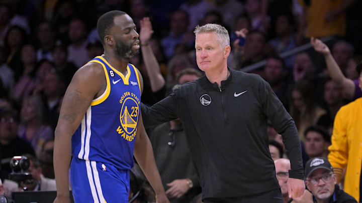 May 12, 2023; Los Angeles, California, USA; Golden State Warriors forward Draymond Green (23) walks past head coach Steve Kerr after fouling out in the second half of game six of the 2023 NBA playoffs at Crypto.com Arena. Mandatory Credit: Jayne Kamin-Oncea-Imagn Images