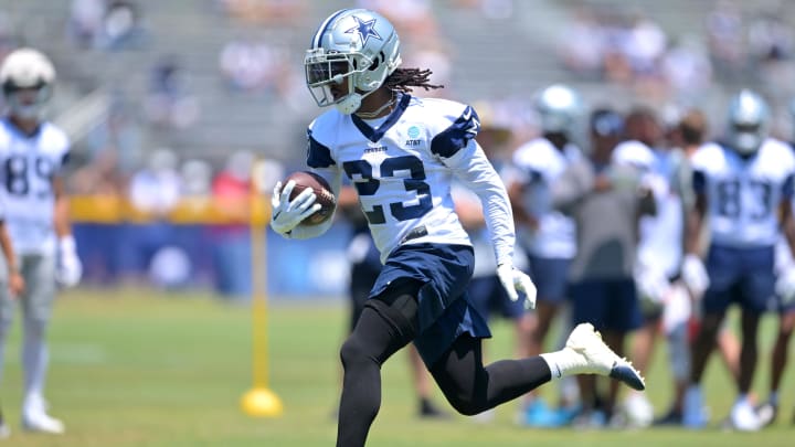 Onxard, CA, USA;  Dallas Cowboys running back Rico Dowdle (23) runs the ball for a touchdown during training camp at River Ridge Fields in Oxnard, CA. 