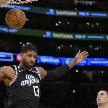 Jan 24, 2023; Los Angeles, California, USA; Los Angeles Clippers guard Paul George (13) goes for a dunk in the second half against the Los Angeles Lakers at Crypto.com Arena. Mandatory Credit: Jayne Kamin-Oncea-USA TODAY Sports