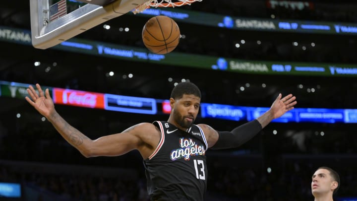 Jan 24, 2023; Los Angeles, California, USA; Los Angeles Clippers guard Paul George (13) goes for a dunk in the second half against the Los Angeles Lakers at Crypto.com Arena. Mandatory Credit: Jayne Kamin-Oncea-USA TODAY Sports