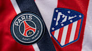 The Paris Saint-Germain and Atletico Madrid Badges